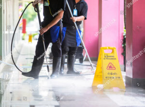 stock-photo-man-cleaning-the-ground-floor-533509489